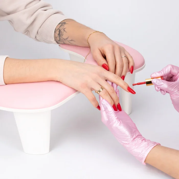 Molly Nails Soporte para manicura color rosa