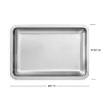 Bandeja metálica rectangular plateada para herramientas